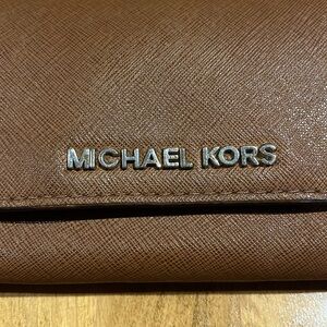 Used women’s Michael Kors, wallet,